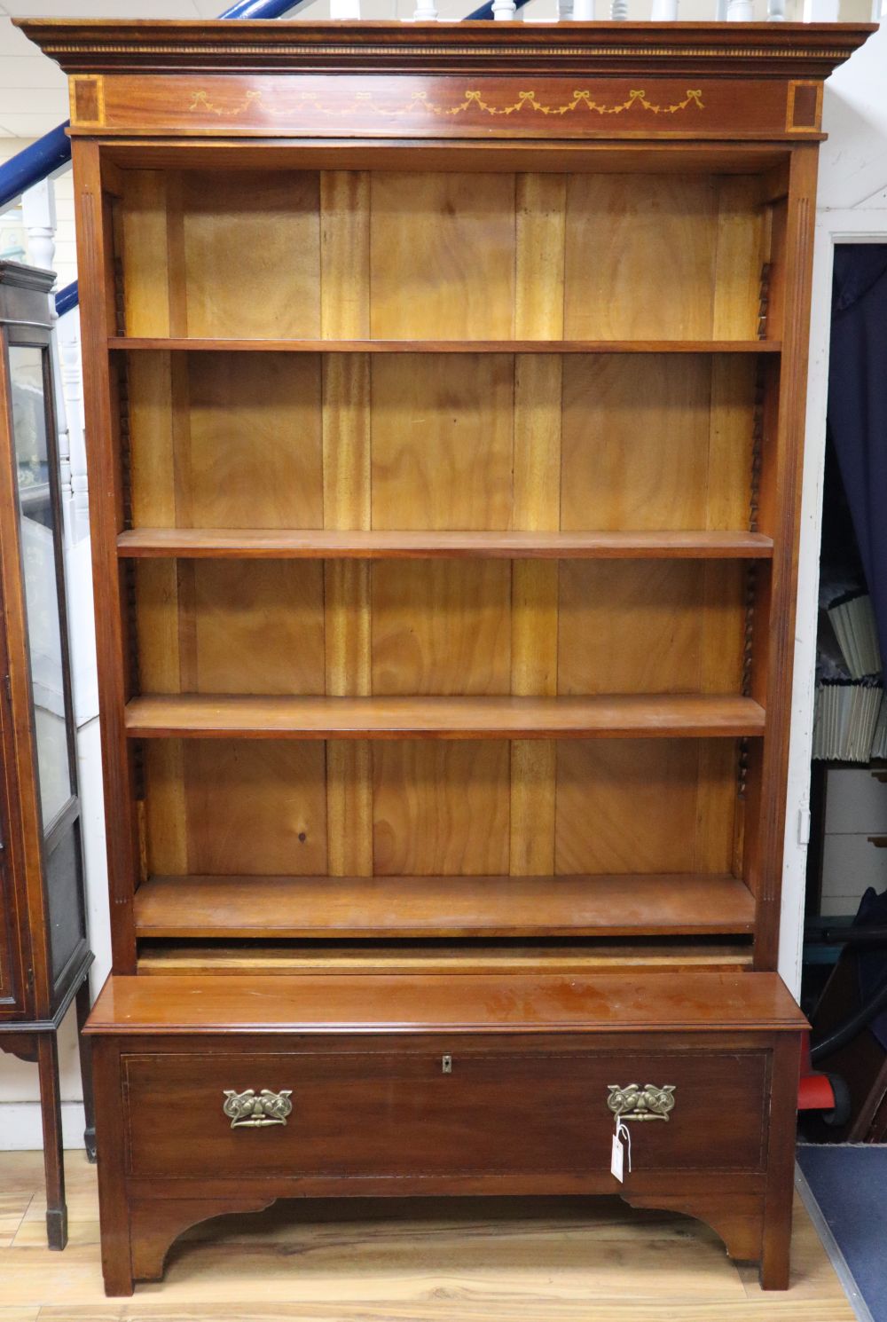 An Edwardian style inlaid mahogany open bookcase, W.130cm, D.48cm, H.206cm